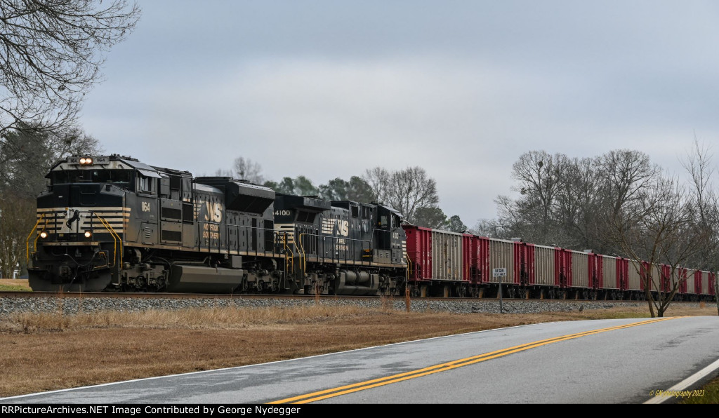 NS 1164 & 4100 with a Herzog Ballast train